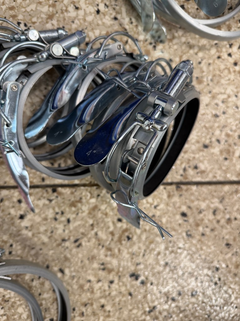 Blastgate Company 4 inch clamps.